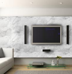 The marble-­?like prints have invaded the furniture